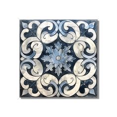 a blue and white tile with an intricate design on the back side, in square shape