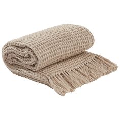 a beige blanket folded on top of each other