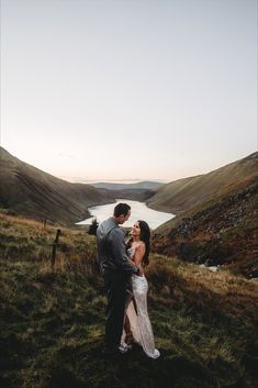 A couple in a Scottish landscape Scotland Honeymoon Aesthetic, Scotland Engagement Photos, Scotland Couple, Ireland Couples Photography, Couple In Edinburgh, Honeymoon In Scotland, Scotland Couple Photography, Visiting Scotland, Scottish Landscapes