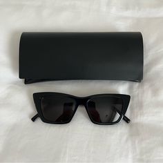 Authentic Ysl Saint Laurent Sl 276 Mica 53mm Cat Eye Sunglasses Brand: Saint Laurent Color: Shiny Black/Grey Solid 100% Authentic. Excellent Used Condition. No Defects. Authenticity Card, Original Case, And Cloth Included. Purchased From Nordstrom In January 2023. Screenshot Of Order Confirmation Is Included. Cat Eye Sunglasses With A Sharp, Angular Look Are Fitted With Lightweight Nylon Lenses For A Bold Style That's Also Super Wearable. - 100% Uva/Uvb Protection - Frames Compatible With Corrective Lenses - Temples Engraved With Saint Laurent Paris - Dimensions: Lens 53 Mm / 2.1", Bridge 16 Mm / 0.6", Temple 145 Mm / 5.7" - Acetate - Made In Italy Smoke Free Home. All Orders Ship Sa Sharp Sunglasses, Sl 276 Mica, Fancy Glasses, Ysl Saint Laurent, Saint Laurent Sunglasses, Order Confirmation, Sunglasses Brand, January 2023, Saint Laurent Paris