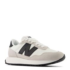 PRICES MAY VARY. Retro style, exposed foam tongue detail Unbacked suede and mesh upper Oversized N logo with asymmetric rubber tip wrap Large scale ripple outsole and EVA rubber midsole Angled ‘New Balance’ text at heel tab New Balance Classics, N Logo, Athletic Sandals, New Balance Black, Wedge Loafers, Popular Shoes, Brooks Shoes, Vionic Shoes, Everyday Shoes