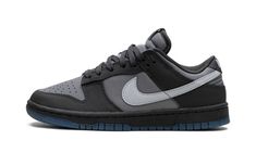 The Nike Dunk Low "Anthracite" is a neutral-colored, versatile look for the classic sneaker.  A combination of materials in hues of grey can be found throughout the design, with Cool Grey ripstop nylon appearing on the mid-panel and grey leather landing on the perforated toe.  Anthracite-colored synthetic nubuck overlays add to the shoe’s greyscale look.  A white leather Swoosh is found on either side of the shoe.  “Nike” detailing can be seen on the heel and on the tongue tag.  Underfoot, a dar Jordan New, Shoes Streetwear, Pretty Shoes Sneakers, Cinderella Shoes, Shoe Wishlist, Shoe Nike, Hype Shoes, Stadium Goods, Grey Sneakers