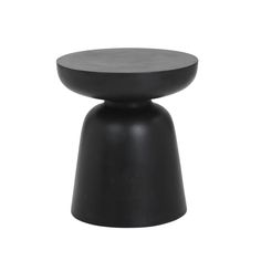 a black stool with a round top on it's legs and one foot resting on the ground