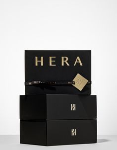 two black boxes stacked on top of each other with the word hera written on them