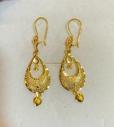 Solid gold 22k / 916 gold purity  Descriptions:- Turkish Design Dangling Earrings, 916 Gold  Solid 22k Pure Gold, Beautiful crescent Moon Dangling Earrings with, 916 Gold  GOLD PURITY : 22k pure yellow gold , 916 GOLD Colour : YELLOW GOLD Total Appx weight : 3.32 grams   Width : Appx 1.5cm - pls see pic with ruler Length : Appx 4.3 - pls see pic with ruler  Hallmark: Hallmarked 916 stamp Design : Beautiful Shining Moon Dangling Earrings with Heart Charms FAQs Q: Is it real gold? A: yes it's real authentic genuine 916 gold  Q: can pawn? A: yes it's pawnable ⭐GoForGold⭐ 22k Gold Earrings Studs, Hangings Gold Earrings, Turkish Gold Jewelry, Earrings With Price, 22k Gold Earrings, Bridal Jewelry Sets Brides, Gold Jewellry, Fancy Jewellery Designs, Turkish Design