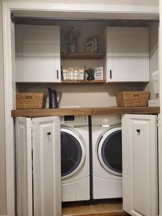 a washer and dryer in a small room