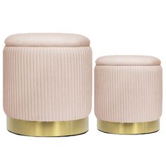 two pink stools with gold trim on the sides and one is made out of fabric