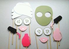 the masks are made out of paper and have toothpicks