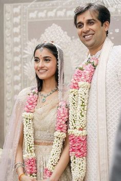 a man and woman standing next to each other