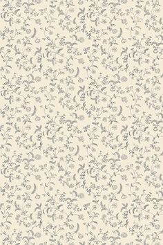 a white and gray wallpaper with small flowers