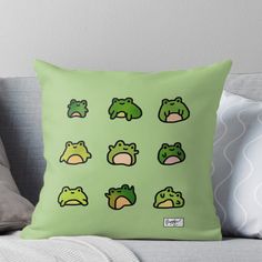 frog faces on a green background throw pillow