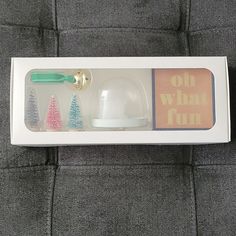 an open box with toothbrushes and other items in it