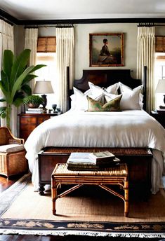 a bedroom with white bedding and wooden furniture