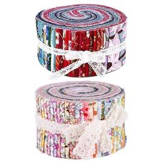 two rolls of multicolored paper with ribbons