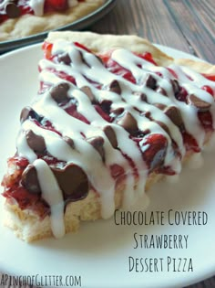 a piece of chocolate covered strawberry shortbread on a plate