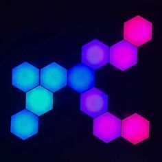 hexagons lit up in the dark with neon colors