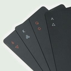 six black playing cards with numbers and symbols on them