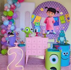 a room with balloons, toys and decorations on the floor for children's birthday party