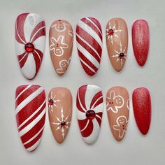 Get festive with our Christmas Gingerbread Candy Cane Glitter Press On Nails! These handmade, reusable nails combine red and brown tones with cute gingerbread and candy cane designs. Perfect for a fun, custom holiday look in short or long styles! 🌸Thank you for supporting my small business.🌸 You can reuse all the nails you purchased from us multiple times, if you handle them with care 📦𝐖𝐡𝐚𝐭 𝐜𝐨𝐦𝐞𝐬 𝐰𝐢𝐭𝐡 𝐲𝐨𝐮𝐫 𝐩𝐫𝐞𝐬𝐬 𝐨𝐧 𝐧𝐚𝐢𝐥 𝐤𝐢𝐭? 10 𝘯𝘢𝘪𝘭𝘴 𝘰𝘧 𝘺𝘰𝘶𝘳 𝘴𝘪𝘻𝘦 Candy Cane Nails Christmas, Red And Pink Christmas Nails, Red Candy Cane Nails, Christmas Candy Nails, Candy Cane Nail Art, Nail Noel, Glitter Press On Nails, Candy Cane Nails, Nail Candy