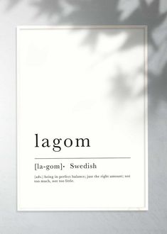 a white poster with the words lagom in black and white font on it