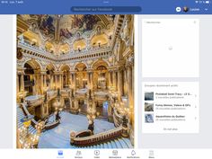 an image of the inside of a building with stairs and chandeliers on it