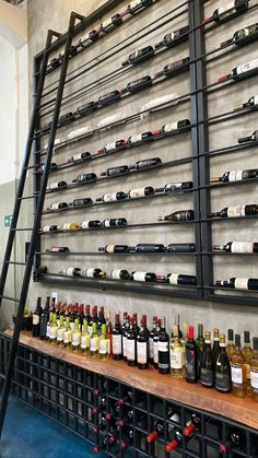 a wine rack filled with lots of bottles