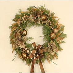 a christmas wreath hanging on the wall