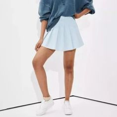 It’s Made From A Soft, Stretch Twill Fabric That Gives It A Structured Look. The Skirt Features Pleats All Over, A Super High Rise, And An Exposed Back Zipper. It Also Has Side Pockets. Blue Skirt For Day Out, Casual Flared Tennis Skirt With Elastic Waistband, High Waist Light Blue Skirt, Casual Blue Denim Skirt With Elastic Waistband, Light Blue Stretch Mini Skirt For Spring, Light Blue Stretch Mini Skirt, Blue Mini Denim Skirt For Fall, Trendy Light Blue Mini Skirt, High Waist Light Blue Lined Skirt