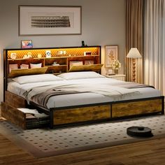 a bed sitting in the middle of a bedroom next to a wooden table and lamp