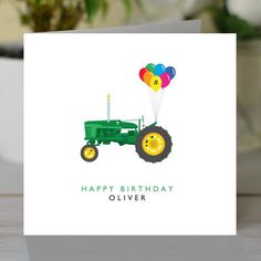 a birthday card with a tractor and balloons on the front that says happy birthday olliver