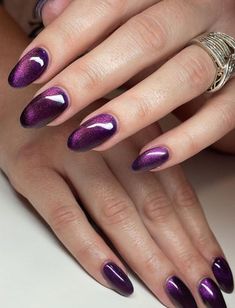 Click to see more.

50 Stunning Cat Eye Nail Designs to Captivate Any Crowd