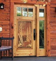 a wooden bench sitting in front of a door with trees on the glass and wood paneling