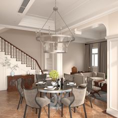 a dining room table with chairs and a chandelier