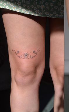 two pictures of the same woman's legs with different tattoos on their butts