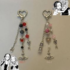 two key chains with charms attached to them