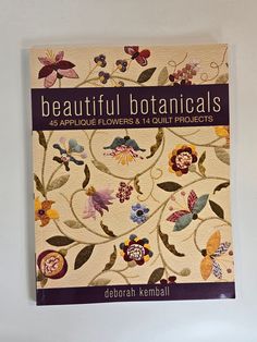 14 sophisticated floral applique projects including pillows, table runner, quilts and wall hangings. Full size templates for flowers, butterflies and borders. The quilts in this book are so absolutely stunning. This 111 page soft cover book is in excellent condition and has all the templates still attached in back.  I ship to Canada and the United States. This book is shipped from a smoke free and cat free home. Applique Projects, Quilt Book, Applique Flowers, Quilt Projects, Cover Book, Book Quilt, Applique Patterns, Floral Applique, Soft Cover