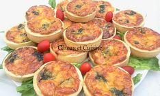 there are many mini quiches on the plate