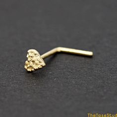 Solid 14k Yellow Gold 3mm Tiny 3mm Nugget Heart 14 Karat Yellow Gold Nose Stud Ring Screw End Metal: Solid 14K Yellow Gold Metal Stamp: 14K Finish: Polished Heart Size: 3mm Thickness: 0.6mm / 22 Gauge  Post Length: 7 mm Backing: Nose Screw Stud *Nickel FREE* It comes with a gift box. Ready for gifting Please read our shop policy before placing your order Thank you for visiting our shop Real Gold Nose Ring, Gold Ring Collection, Gold Nose Piercing, Nugget Jewelry, Gold Nugget Jewelry, Body Jewelry Diy, Custom Gold Jewelry, Xoxo Jewelry, Pandora Bracelet Designs