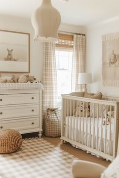 a baby's room is decorated in neutral colors