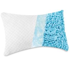 the blue and white pillow is next to each other