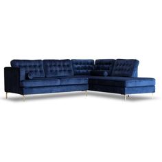 a blue sectional sofa with gold legs