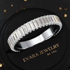 This exquisite 2 carat baguette cut eternity band is the perfect symbol of eternal love. Crafted with lab grown diamonds, known for their exceptional quality and ethical sourcing, this stunning wedding band is a true showstopper. The CVD diamonds are meticulously placed in a three forth eternity design, adding a touch of modern sophistication. The yellow gold setting beautifully complements the art deco inspired style, making this eternity band a timeless piece of jewelry for any occasion.𝐅𝐞𝐚 Stacked Wedding Rings, Cvd Diamond, Gold Art Deco, Yellow Gold Setting, Engagement Rings Oval, White Gold Band, Baguette Cut, Gold Art, Art Deco Inspired