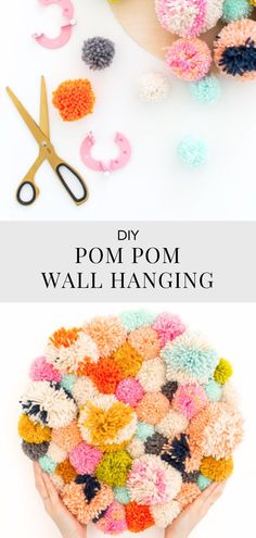 the pom pom wall hanging is made with yarn