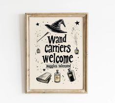 there is a sign that says, wandd carriers welcome guests to the wizard's town