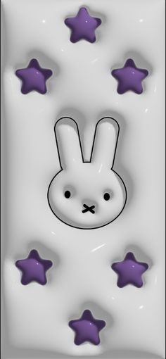 a white rabbit with purple stars on it's face and eyes, in the background is