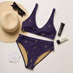 Get ready for compliments all summer long with this uniquely designed sustainable "Mystical Moon & Stars" high waisted bikini set. Enjoy the smooth fabric and the flattering design, and show it off at the beach or by the pool! Removable pads and its double-layer make it comfy to wear all day by the pool or beach. It's made from soft recycled polyester with double-layering and UPF 50+. * Soft and stretchy material with UPF 50+ * Sizes up to 6XL * Bikini top comes with removable padding for comfor Gothic Swimsuit, Bathing Suit Outfits, Mystical Moon, Nice Bikinis, Cute Bikinis, Moon Stars, Style Expert, Sustainable Fabrics, Sun And Moon