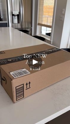 an open box sitting on top of a counter in a kitchen with the words top new amazon finder