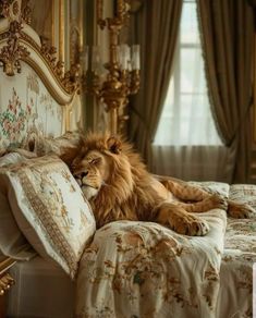 a large lion laying on top of a bed in a bedroom next to a window