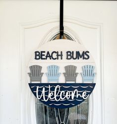 a welcome sign hangs on the front door of a beach bums restaurant in florida