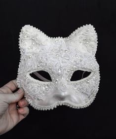 This White Lace Cat Venetian Mask Mardi Gras Carnival Masquerade Costume Ball Bridal Wedding Lent Party is tender, modest and playful at the same time! It is a paper mache mask covered in white lace, transparent sequins, artificial pearls of different sizes, pearly rhinestones and various trim. The sizing would fit an adult or a child, the mask is wide - but please keep in mind that the mannequin in the pictures has a rather narrow face.  The inside of the mask is white and the elastic in the ba Masquarede Ball Masks, Masquerade Ball Costume, Cat Masquerade Mask, Masquerade Mask Diy, Narrow Face, Carnival Masquerade, Ball Costume, Mask Carnival, The Mask Costume